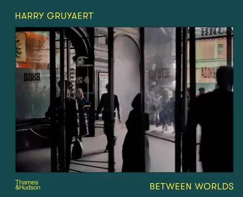 Between Worlds by Harry Gruyaert — book cover