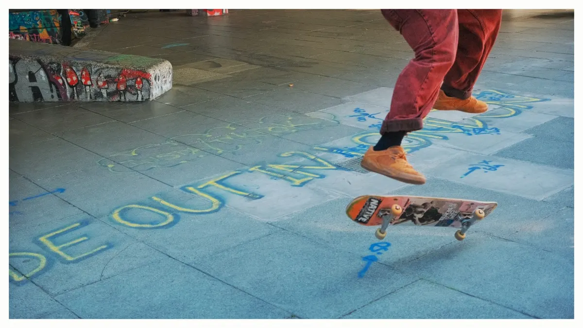 A skater mid-trick at the Southbank Undercroft, London